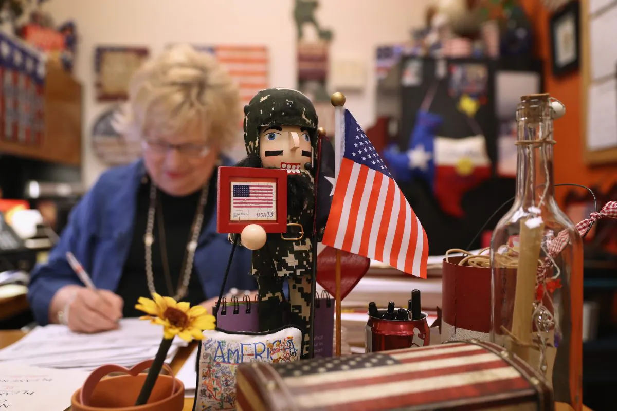 A U.S. Citizenship and Immigration Services supervisor reviews citizenship applications in the Dallas Field Office in Irving, Texas, on Aug. 22, 2016. (John Moore/Getty Images)