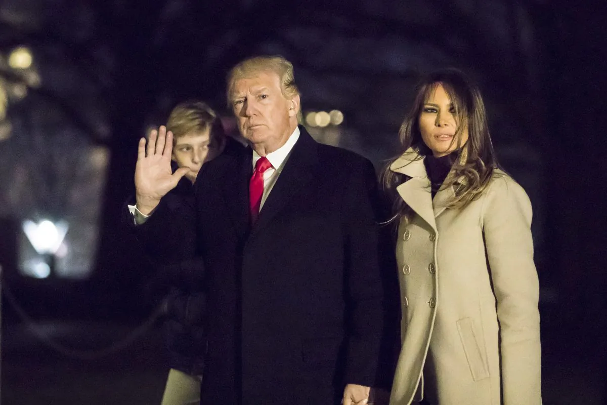 President Donald Trump, First Lady Melania Trump, and their son Barron Trump arrive at the White House in Washington, on Jan. 1, 2018. (Samira Bouaou/The Epoch Times)