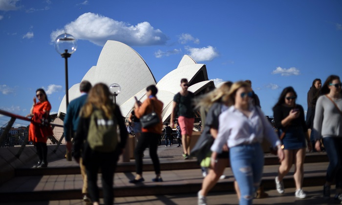 People in front of the iconic Sydney Opera on Sept. 8, 2017. (William West/AFP/Getty Images)