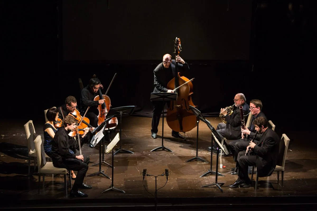 The Ying Quartet (L–R) Robin Scott on violin, Janet Ying on violin, Daniel Panner on viola, David Ying on cello, with Brendan Kane on double bass, Joesph Anderer on horn, William Short on bassoon, Alexander Bedenko on clarinet, play Schubert's Octet in F major, D803 at the Bohemian National Hall on Dec. 14, 2017. (Benjamin Chasteen/The Epoch Times)