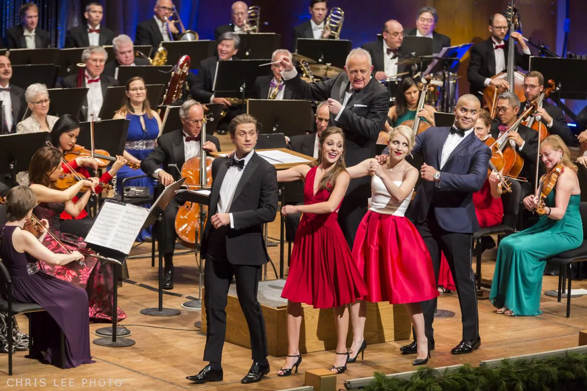 (L–R) Aaron Tveit, Laura Osnes, Annaleigh Ashford, and Christopher Jackson, with Bramwell Tovey conducting The New York Philharmonic’s tribute to Leonard Bernstein, “Bernstein on Broadway.” (Chris Lee)
