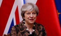 UK PM May Says Trump Committed to Best Interests of United States