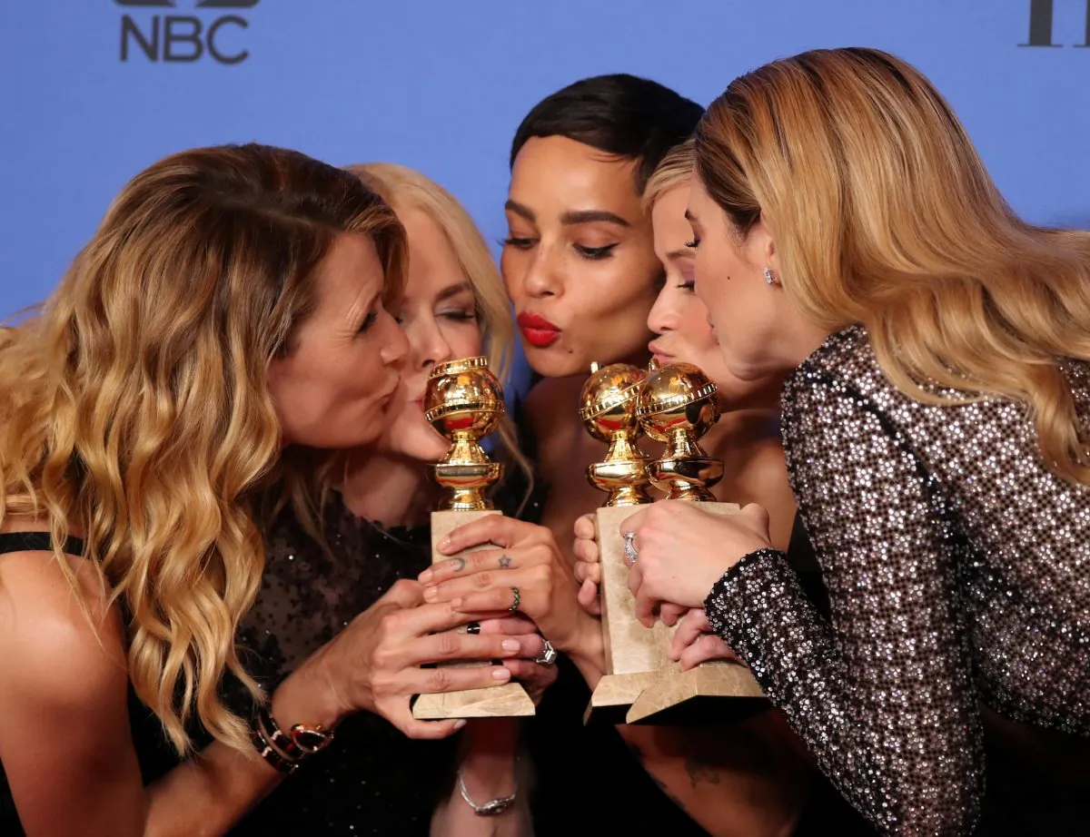 Laura Dern, Nicole Kidman, Zoe Kravitz, Reese Witherspoon and Shailene Woodley (L-R) pose backstage after winning the award for Best Television Limited Series or Motion Picture Made for Television for "Big Little Lies" at the 75th Golden Globe Awards, Beverly Hills, California, Jan. 7, 2018. (Reuters/Lucy Nicholson)