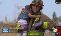 Firefighter Comforts Little Girl After Crash, Goes Viral