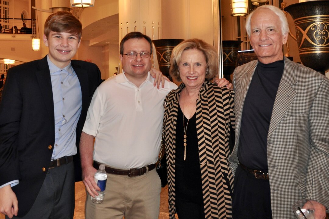 Bill Lorimer (R), his wife, Carolyn, his son, John Lorimer (2nd L), and grandson, Wish Lorimer (L), enjoyed watching Shen Yun at the Bass Performance Hall in For Worth, Texas on Jan. 8, 2018. Wish Lorimer, a high school student, added that the performance was a must see, given its dancing, storytelling and technical aspects. (Amy Hu/The Epoch Times) 