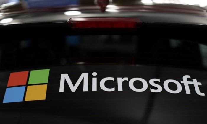 The Microsoft logo is shown on an electric car at the Auto Show in Los Angeles, California, U.S., November 28, 2017.      (Reuters/Mike Blake)