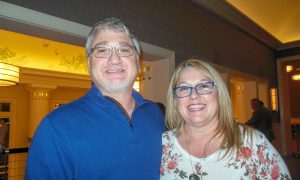 Senior Company Manager Enjoys Erhu Performance at Shen Yun