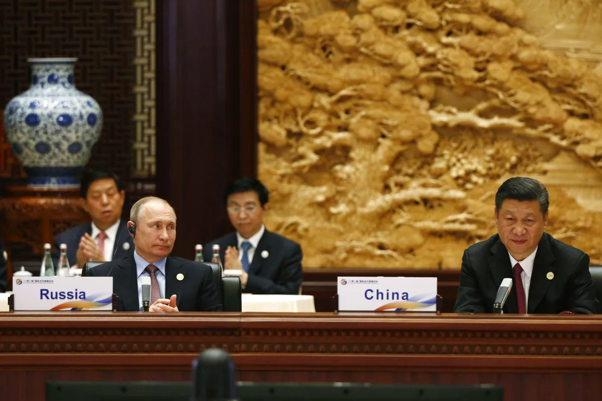 Russian President Vladimir Putin and Chinese leader Xi Jinping attend a summit at the Belt and Road Forum in Beijing, China on May 15, 2017. (Thomas Peter-Pool/Getty Images)