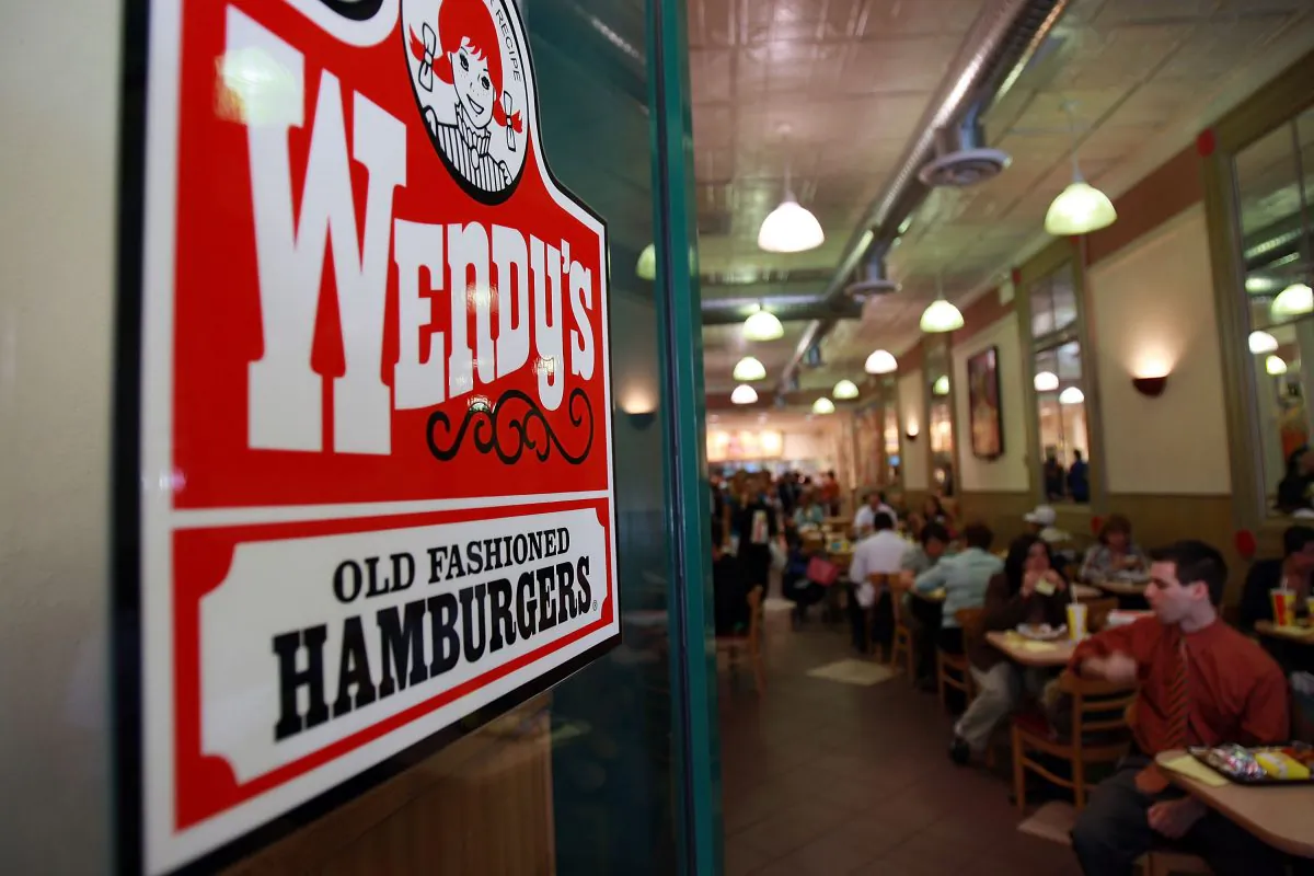 People eat in a Wendy's. (Spencer Platt/Getty Images)