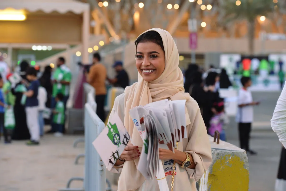 A Saudi woman is seen during the soccer match between Al-Ahli against Al-Batin at the King Abdullah Sports City in Jeddah, Saudi Arabia Jan. 12, 2018. (Reuters/Reem Baeshen)