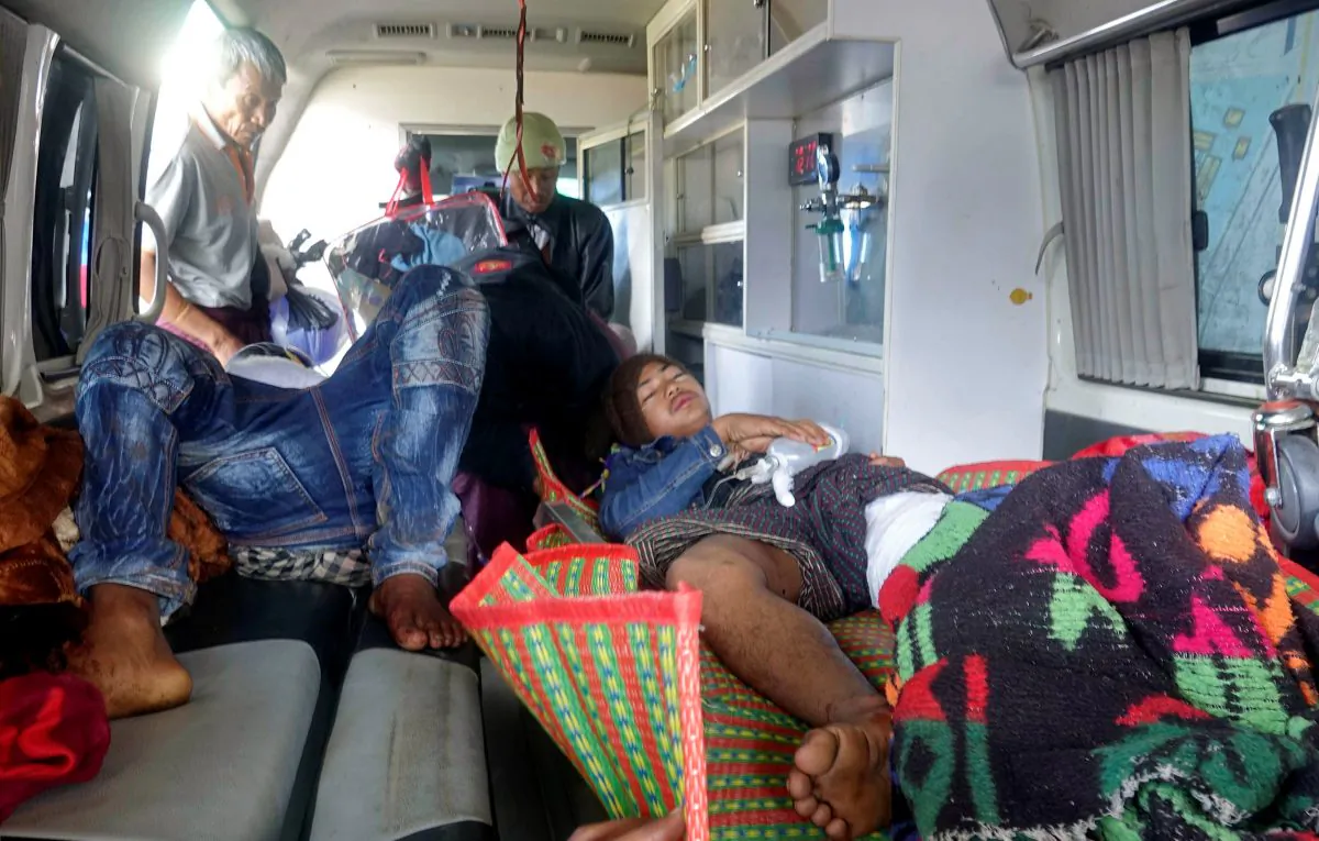 Rakhine State residents arrive at the hospital in Sittwe, Burma, after getting injured by the police in a demonstration the night before, Jan. 17, 2018. (Reuters/Stringer)