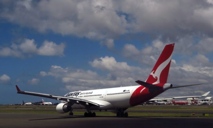 A Qantas Airways Airbus A330 aircraft can be seen on the tarmac near the domestic terminal at Sydney Airport in Australia, Nov. 30, 2017.  (Reuters/David Gray)