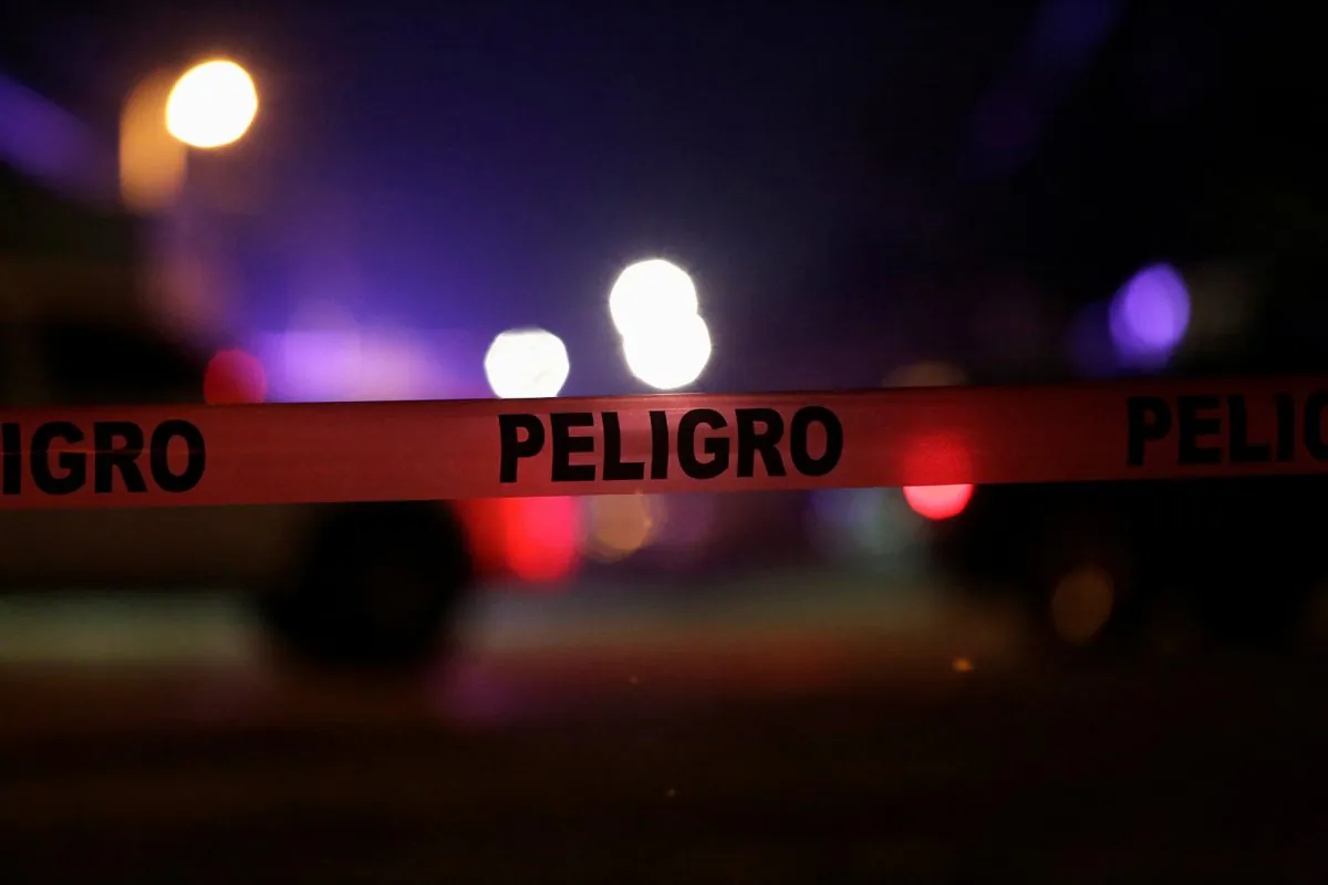 A police cordon reading "Danger" in Ciudad Juarez, Mexico, on Jan. 4, 2018. (Jose Luis Gonzalez/Reuters)