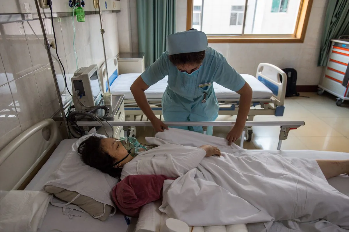 A woman is treated at a hospital in Xi'an, in China's Shaanxi Province on August 11, 2017. (STR/AFP/Getty Images)