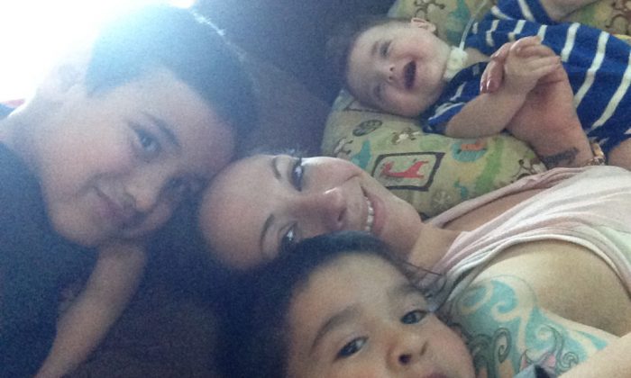 Michelle Leavy and her three sons, ages 7, 5, and 3. She became addicted to opioids when she was discharged from the hospital with doctors' advice to treat her post-c-section pain with opioids. She is now in recovery. (Courtesy of Michelle Leavy)