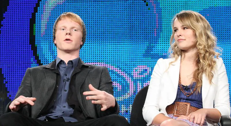 Actors Adam Hicks and Bridgit Mendler speak at Disney ABC Television Group's TCA "Winter Press Tour" Panels at The Langham Hotel in Pasadena, California on Jan. 10, 2011. (Photo by Frederick M. Brown/Getty Images)