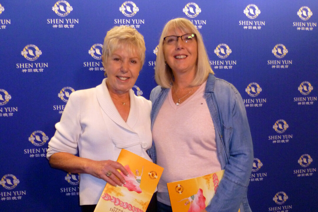 Professor Janet Pierce (R) and her sister, Jean Ellis, enjoyed the Shen Yun performance at FirstOntario Concert Hall in Hamilton, Canada, on Jan. 26, 2018. “I saw this show in Calgary about eight years ago. I loved it, and when I knew it was coming here I wanted to see it again. It’s wonderful,” Ms. Ellis said. (Allen Zhou/The Epoch Times)