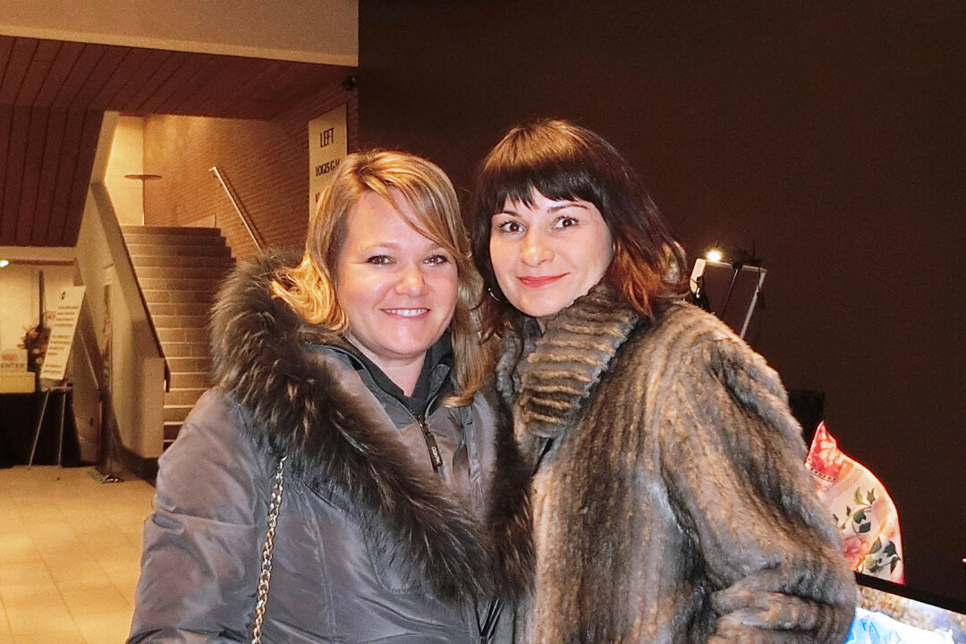 Tracy Fisher (L) and Renata Plecity enjoyed the Shen Yun performance at Centre In The Square in Kitchener, Canada, on Jan. 27, 2018. “I think the production was amazing. The costumes were just beyond beautiful, and even the production on the stage, with using the screen and the technology behind it was really good. Excellent job,” said Ms. Plecity. (Dongyu Teng/The Epoch Times)
