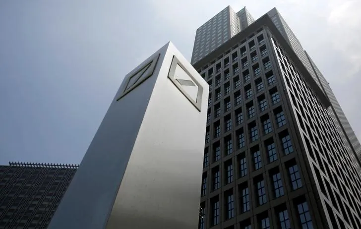 Logos of Deutsche Bank AG are seen in Tokyo July 16, 2014. (Reuters/Toru Hanai/File Photo)