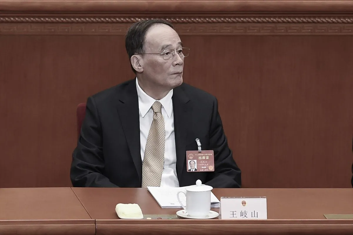 Wang Qishan, former member of the Politburo Standing Committee of the Chinese Communist Party, attends the opening session of the National People's Congress in Beijing's Great Hall of the People on March 5, 2017. (Wang Zhao/AFP/Getty Images)