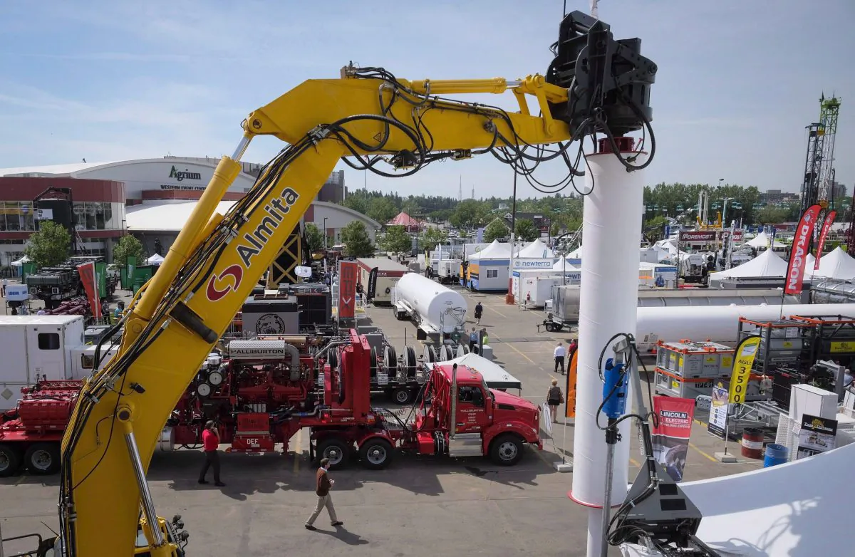 Heavy machinery on display at the Global Petroleum Show in Calgary in a 2016 file photo. Five years after Alberta raised a record-setting $3.5 billion at auctions of provincially owned oil and gas drilling rights, sales are on pace this year to set a historic low, part of a downward trend seen across Western Canada. (The Canadian Press/Jeff McIntosh, File)