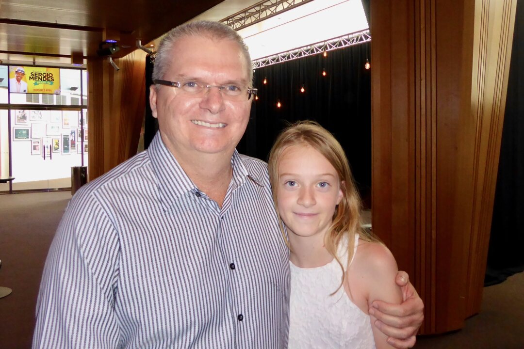 Gavin Thompson and daughter, Amelia, enjoyed Shen Yun Performing Arts' matinee performance at the Canberra Theatre on Feb. 1, 2018. (Steve Xu/The Epoch Times)