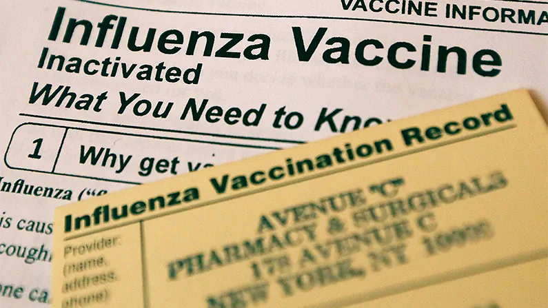 This photo illustration shows Influenza vaccine paperwork for patients. (Mario Tama/Getty Images)