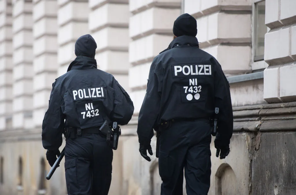 Policemen patrol in front of the court in Celle near Hanover, central Germany, prior to the continuation of the trial against notorious Iraqi hate preacher Abu Walaa (unseen), described as the ISIS group's de facto leader in Germany, on November 7, 2017.
(Julian Stratenschulte//AFP/Getty Images)