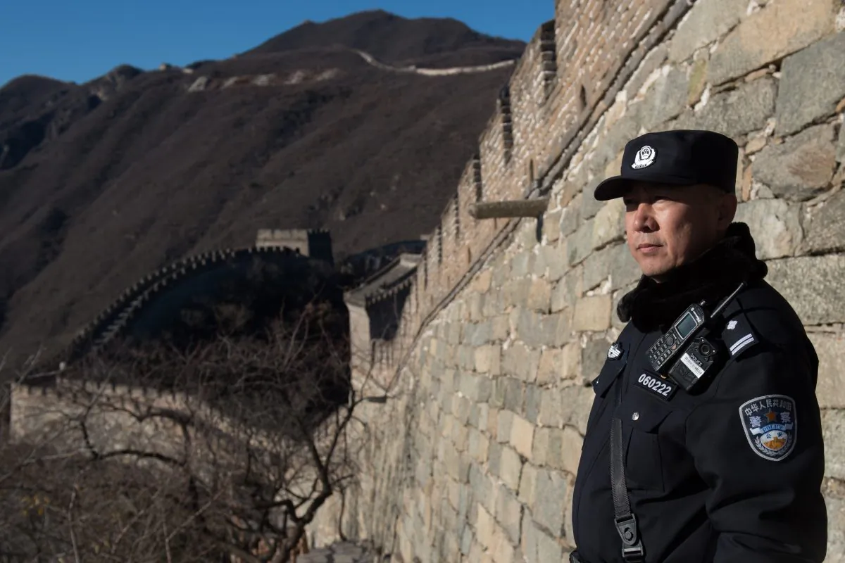 A Chinese policeman near the Great Wall of China on the outskirts of Beijing on Nov. 10, 2017. (Nicolas Asfouri/AFP/Getty Images)