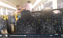 Brutal Punch-up on Sydney Train Ends in a Hug