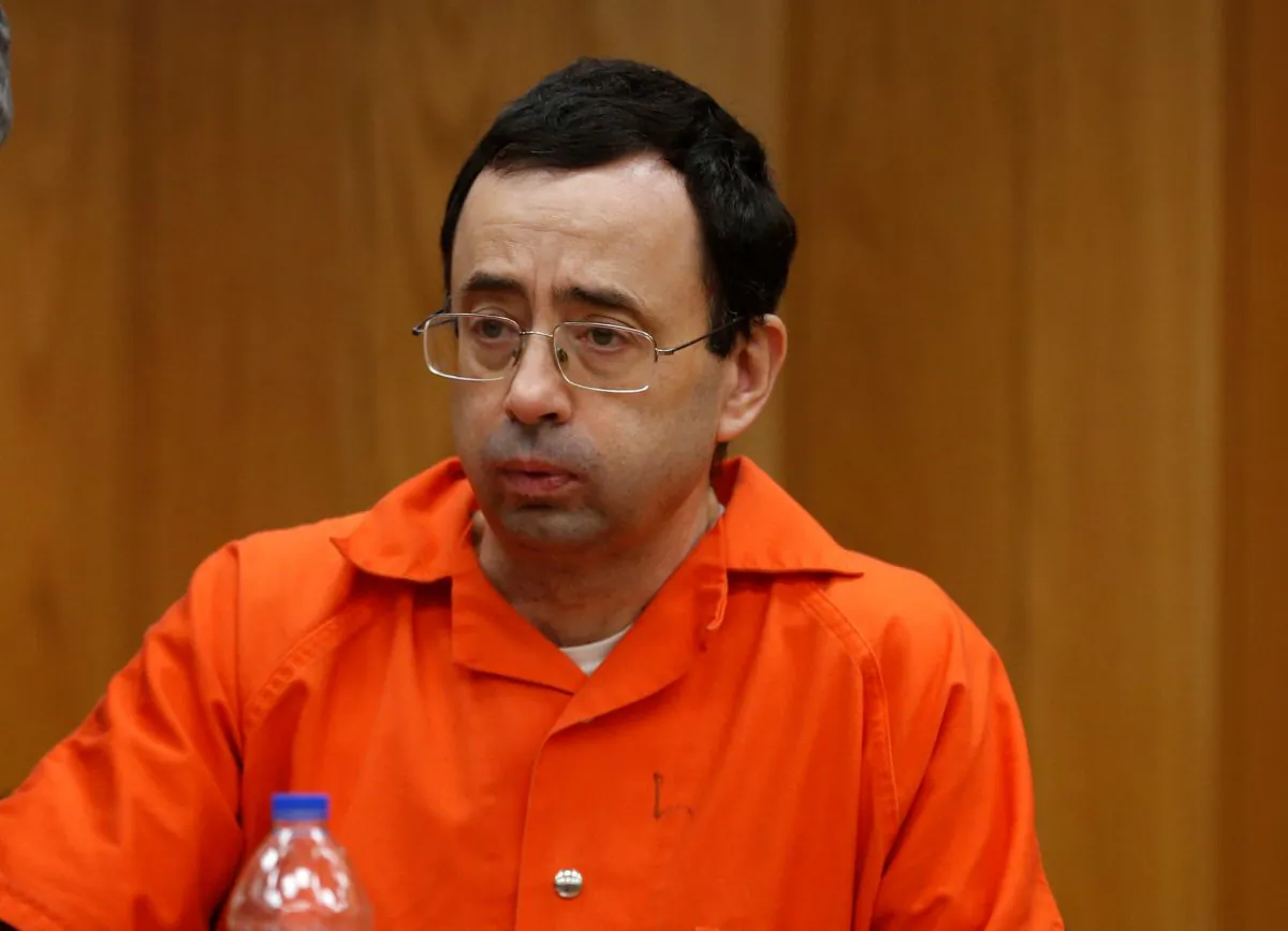 Dr. Larry Nassar, a former Team USA Gymnastics doctor who pleaded guilty in November 2017 to sexual assault charges, sits in the courtroom during his sentencing hearing in the Eaton County Court in Charlotte, Michigan, U.S., Feb. 2, 2018.  (Rebecca Cook/Reuters)