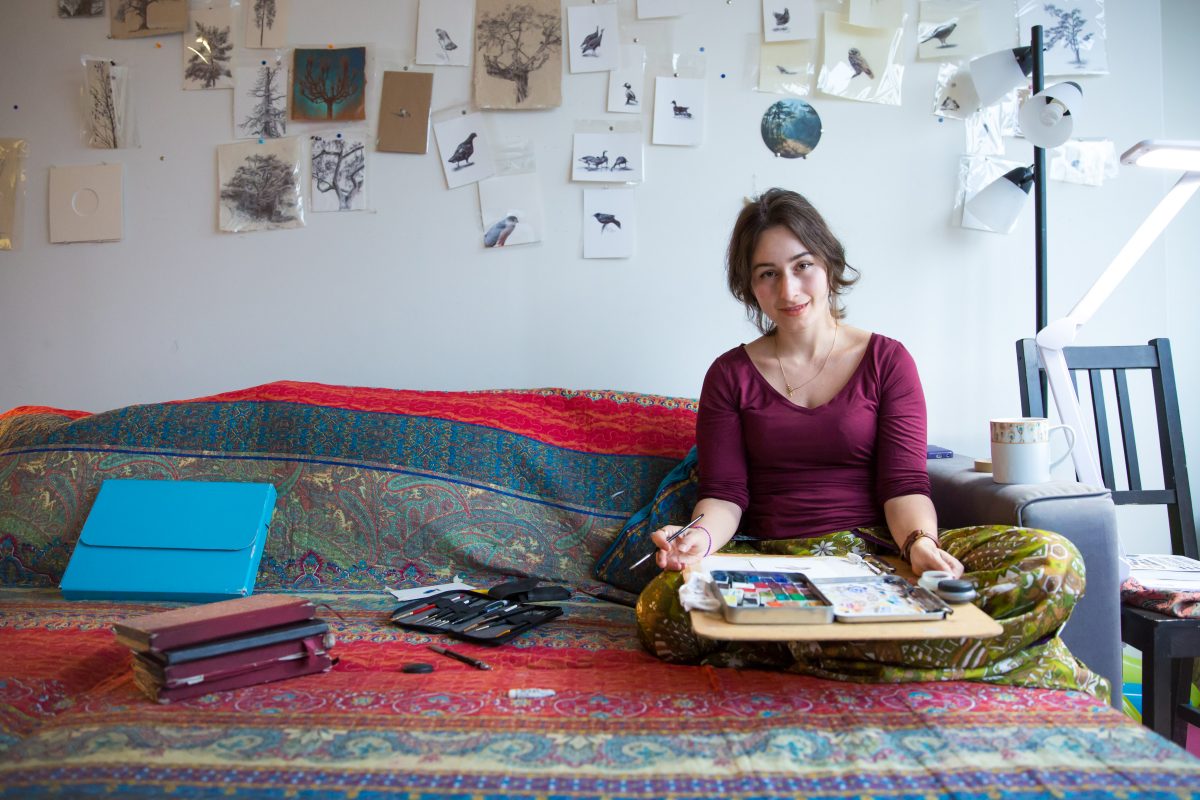 Artist Dina Brodsky with her painting materials at her home in Long Island City in Queens, New York, on Jan. 22, 2018. (Benjamin Chasteen/The Epoch Times)