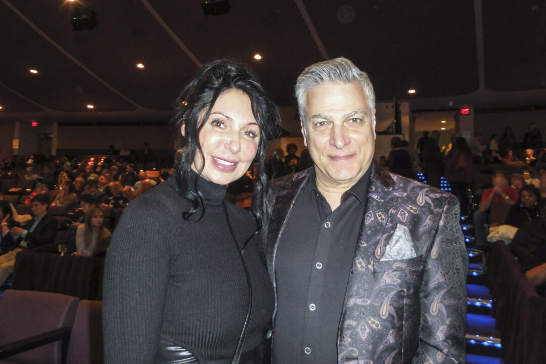 Greg DiLeo with a companion enjoyed a performance by Shen Yun Performing Arts at the Mahalia Jackson Theater of the Performing Arts, New Orleans, on Feb. 3, 2018. (Sophia Zheng/The Epoch Times)