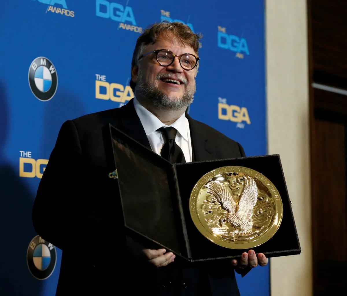 Director Guillermo del Toro holds his award for Outstanding Directorial Achievement in Feature Film for "The Shape of Water" at the 70th Annual DGA Awards in Beverly Hills, California, U.S., February 3, 2018. (Reuters/Mario Anzuoni)