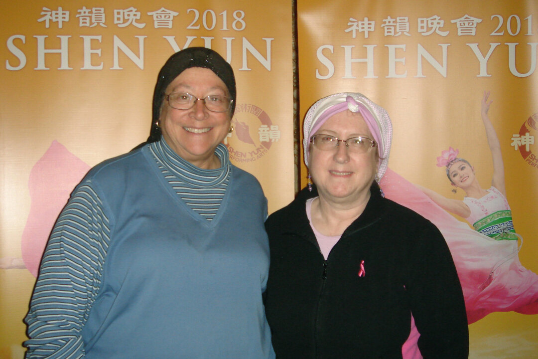 Belinda Solomon, music teacher, and her friend Lisa Adler enjoyed the Shen Yun performance at the State Theatre in Cleveland, Ohio, on Feb. 4, 2018. (Michael Huang/The Epoch Times) 
