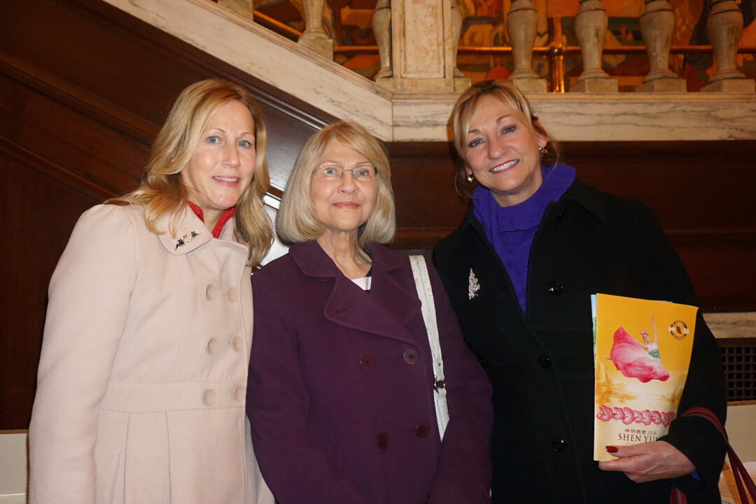 (L to R) Christian, Peg,, and Morgan Weekley enjoyed the Shen Yun performance at the State Theatre in Cleveland, Ohio, on Feb. 4, 2018. (Nancy Ma/The Epoch Times)