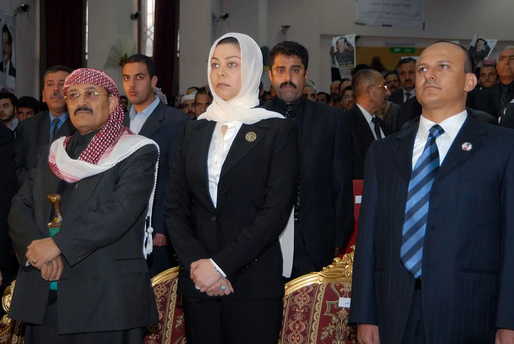 Raghad Saddam Hussein (C), the daughter of the late former Iraqi dictator Saddam Hussein, attends a memorial service held in Yemen on the 40th day after his execution on Feb. 7, 2007. (Khaled Fazaa/AFP/Getty Images)