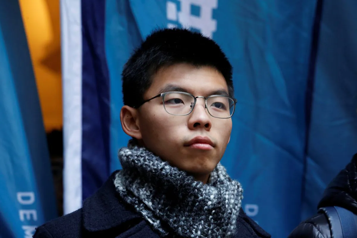Pro-democracy activist Joshua Wong poses outside the Court of Final Appeal before a verdict on his appeal in Hong Kong, China Feb. 6, 2018. (Reuters/Bobby Yip)