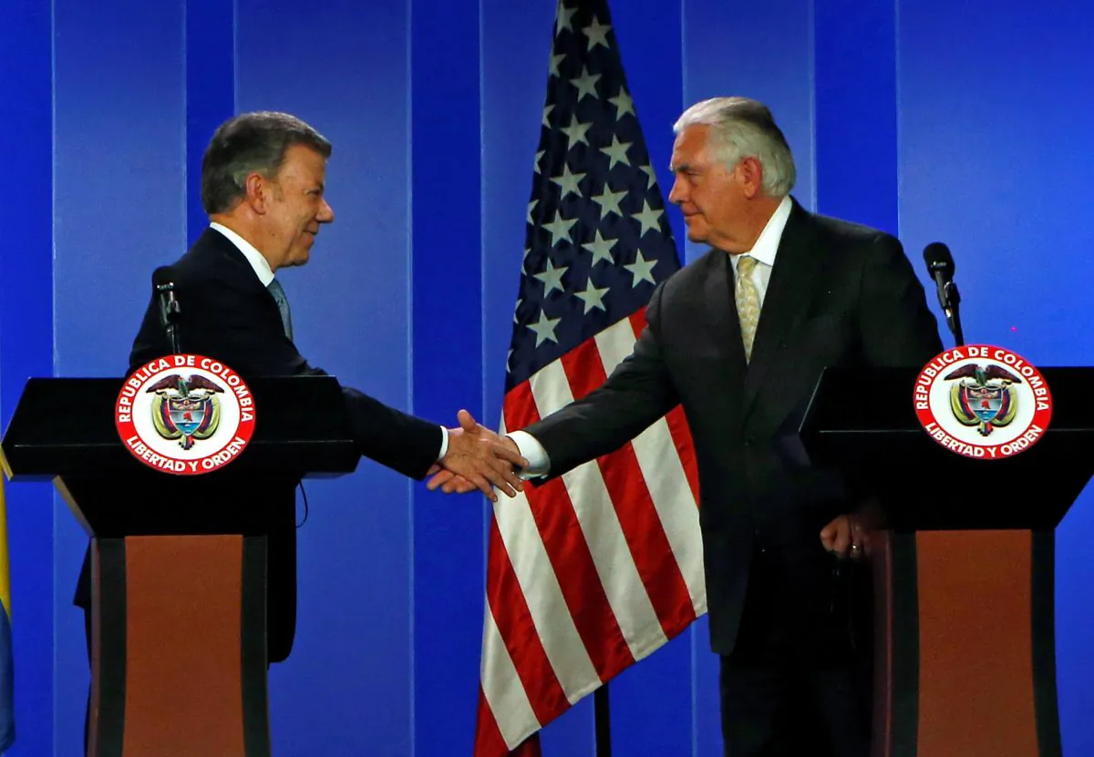 Colombia's President Juan Manuel Santos and U.S. Secretary of State Rex Tillerson shake hands during a joint news conference in Bogota, Colombia Feb. 6, 2018. (Reuters/Jaime Saldarriaga)