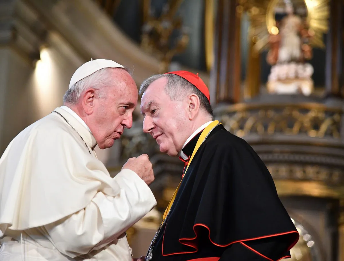 Pope Francis speaks with Vatican Secretary of State, Cardinal Pietro Parolin during the Pope’s visit to Lima's Cathedral on Jan. 21, 2018. Parolin is spearheading the Vatican’s negotiation with China to resume diplomatic relations, which is expected to be finalized within a few months, following Vatican’s recent capitulation to the Chinese regime on the issue of the appointment of bishops. (Vincenzo Pinto/AFP/Getty Images)
