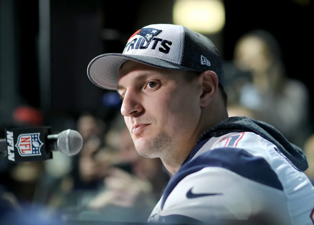 Rob Gronkowski of the New England Patriots speaks to the press during the New England Patriots Media Availability for Super Bowl LII at the Mall of America in Bloomington, Minn., on Feb. 1, 2018. (Elsa/Getty Images)