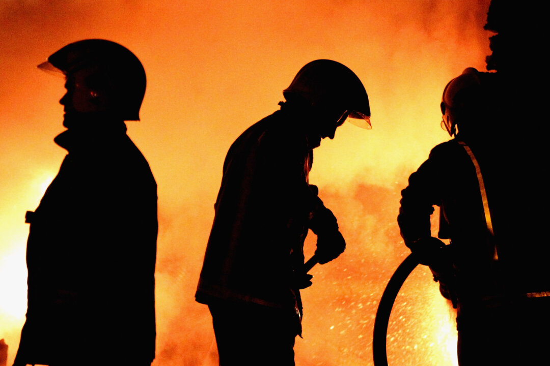 Fire crews attend an incident in Calton area of Glasgow on November 5, 2010 in Glasgow, Scotland.
(Jeff J Mitchell/Getty Images)