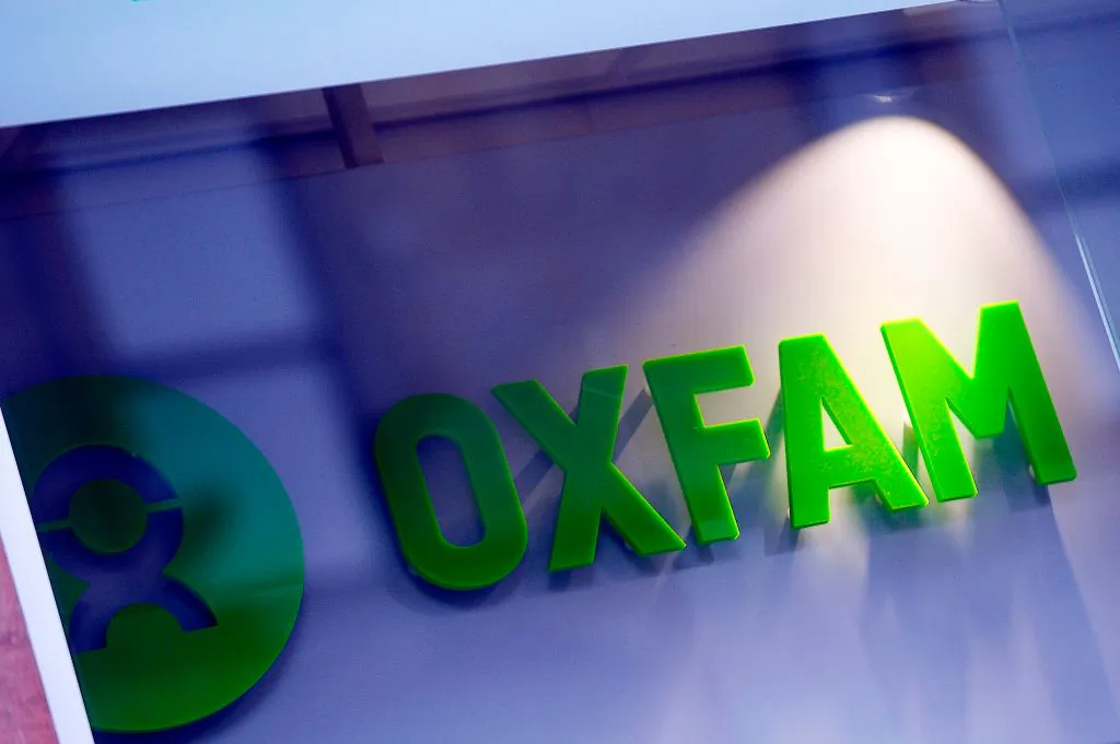 The logo on the front of an Oxfam bookshop is photographed in Glasgow on February 10, 2018. 
The British Government announced late on February 9 it was reviewing all work with Oxfam amid revelations the charity's staff hired prostitutes in Haiti during a 2011 relief effort on the earthquake-hit island. (Andy Bechanan /AFP/Getty Images)