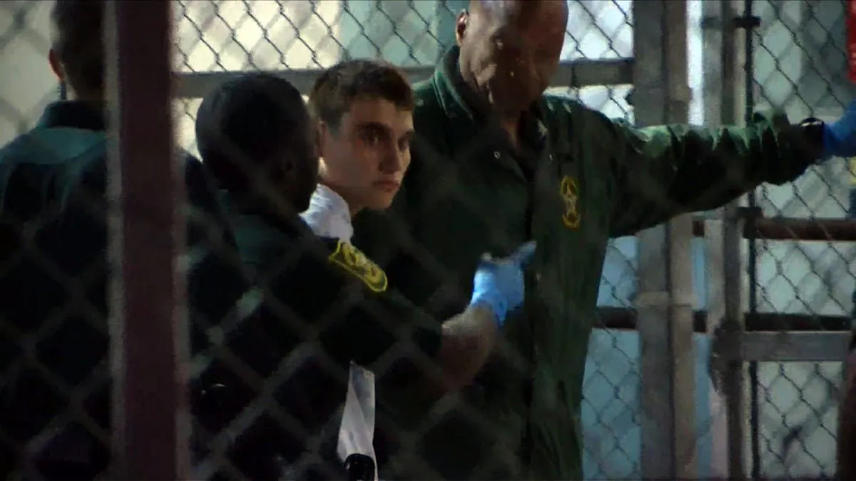 This video screen grab image shows shooting suspect Nikolas Cruz at Broward County Jail in Ft. Lauderdale, Florida on Feb. 15, 2018. The heavily armed teenager who gunned down students and adults at a Florida high school was charged Thursday with 17 counts of premeditated murder, court documents showed. (Miguel Guttierez/AFP/Getty Images)