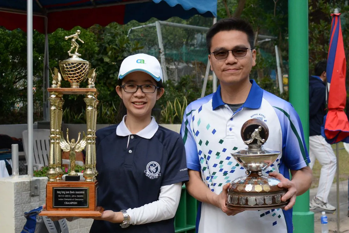 Tony Cheung (R) and Angel So showing their Champion of Champions trophy after prevailed in their respective finals last Sunday (Feb 11). (Stephanie Worth)