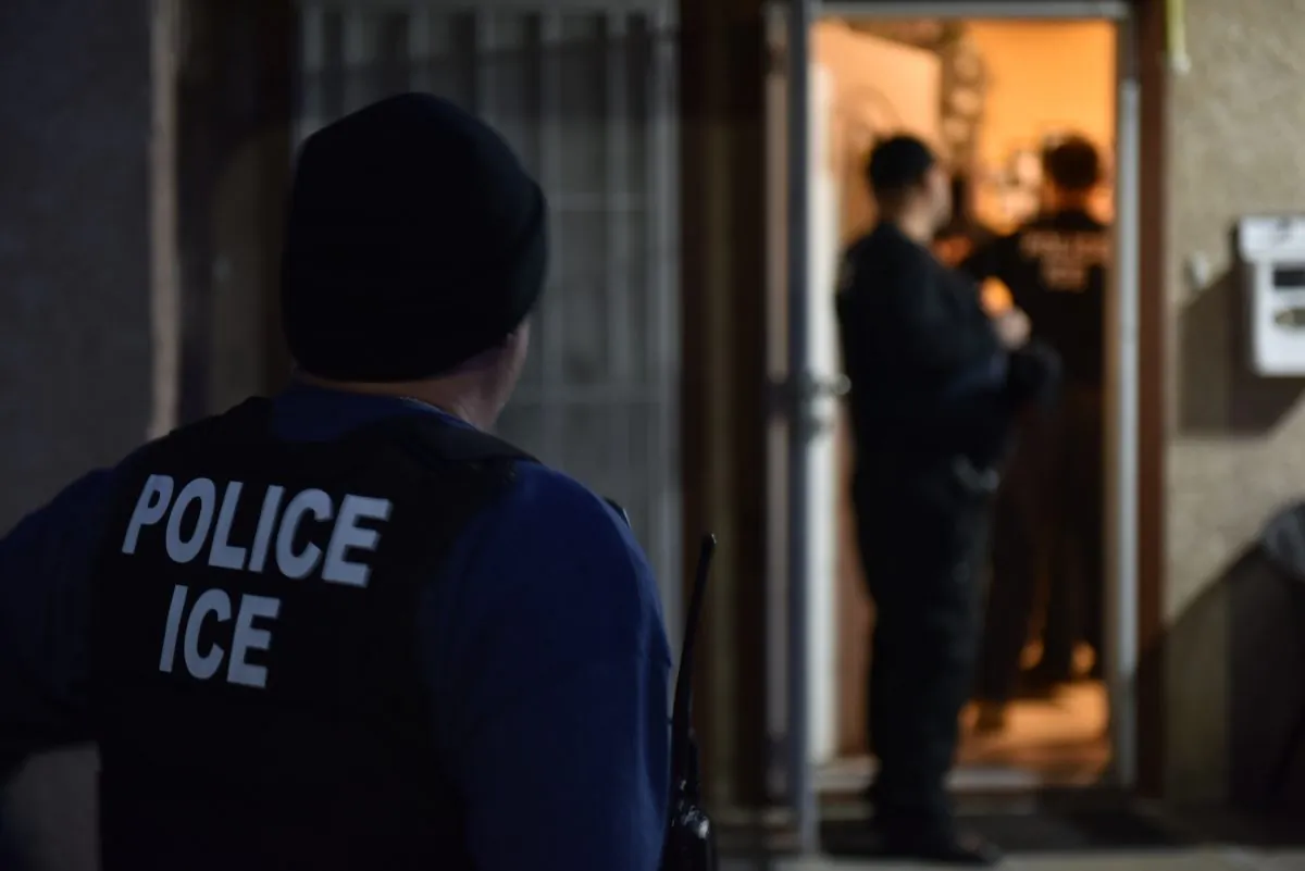 Immigration officers arrest illegal immigrants, in this file photo. (ICE)