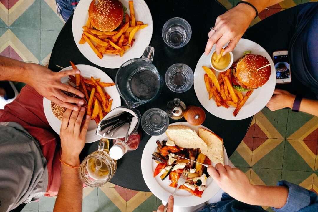 Friends influence us in many ways including how we eat, so try to keep your goals in mind even when you are out and about. (Dan Gold/Unsplash)