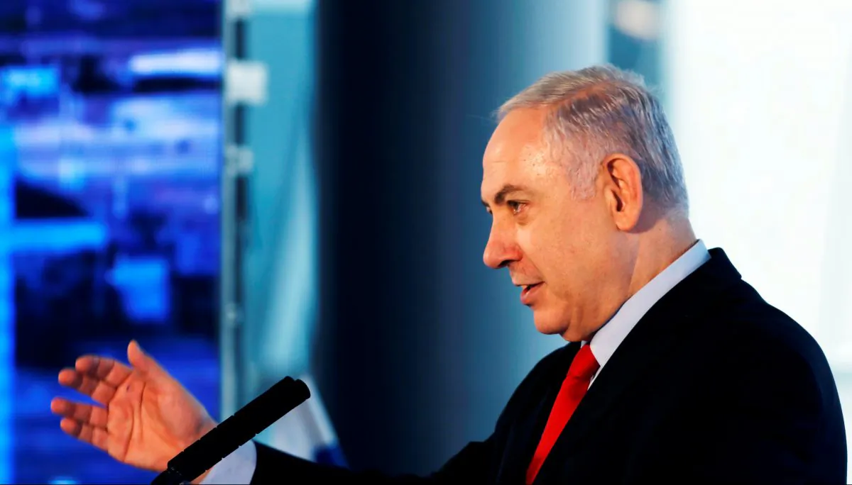 Israeli Prime Minister Benjamin Netanyahu speaks during the dedication ceremony of a new concourse at the Ben Gurion International Airport, near Lod, Israel Feb. 15, 2018. (Reuters/Ronen Zvulun)