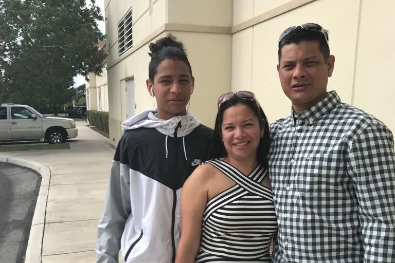 Anthony Borges (L) and his parents. (GoFundMe)