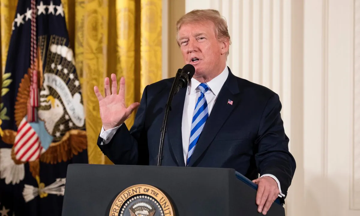 President Donald Trump hosts a Public Safety Medal of Valor Awards Ceremony in the East Room of the White House in Washington on Feb. 20, 2018. (Samira Bouaou/The Epoch Times)
